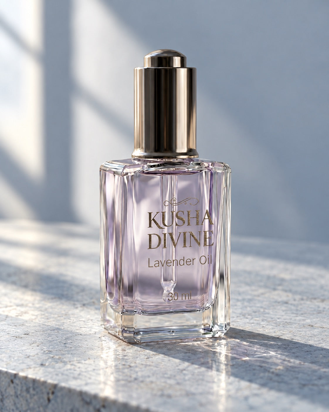 KUSHA DIVINE lavender oil in a glass dropper bottle on pale stone
