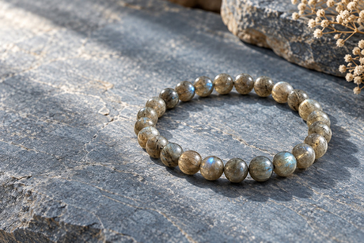 Labradorite bead bracelet on grey stone