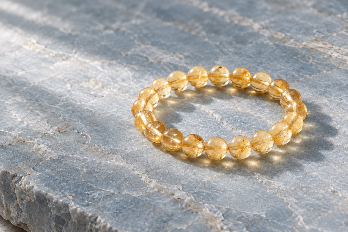 Citrine bead bracelet on pale grey stone